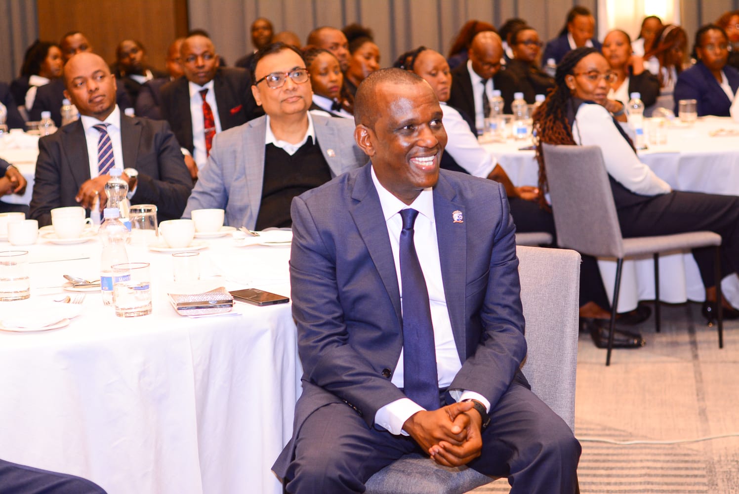 James Waweru with team